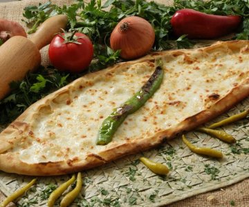 Kaşarlı Pide -  A Turkish style pizza with melted mild cheddar on