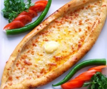 Kaşarlı Yumurtalı Pide -  A Turkish style pizza with melted mild cheddar and egg on
